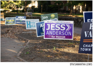 A few signs endorsing candidates in the 2023 municipal election in Chapel Hill. 